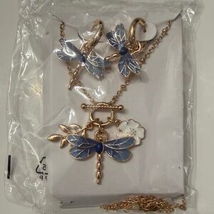 Avon Dragonfly Pendant Necklace and Earring Set - Blue & White Brand new.